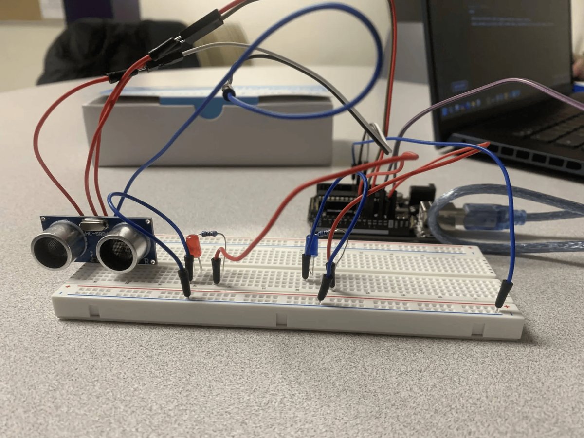 The actual Posture Check Arduino breadboard with ultrasonic sensor and LED